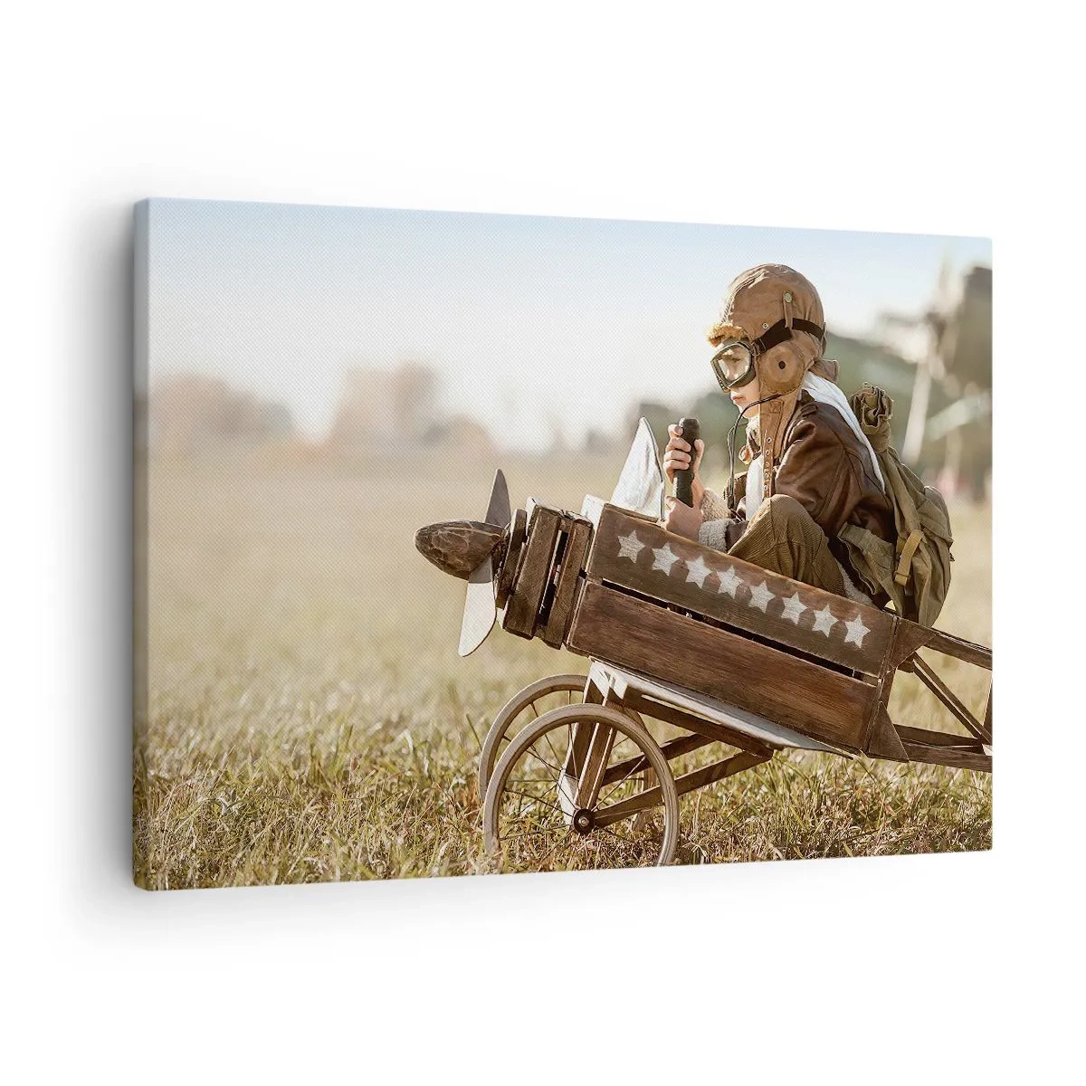 Obraz na plátne - Dieťa v hračkárskom lietadle s poľom v pozadí - 70x50cm - Štart do snov - Moderná nástenná dekorácia do obývacej izby a spálne ARTTOR